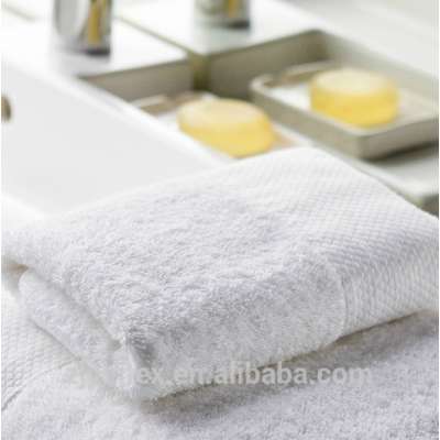 china made 100 cotton towels/Waimaotong supplier hotel white fancy bath towels/low cost 100% cotton towel hotel